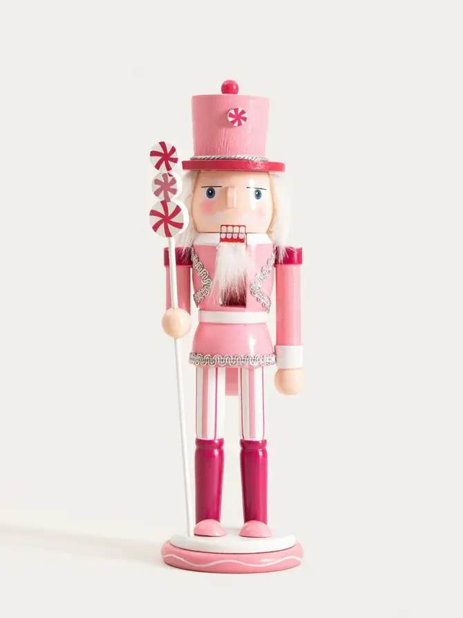 Figurka NUTCRACKER FAIRYTALE dziadek do orzechów różowy z cukierkami 25 cm