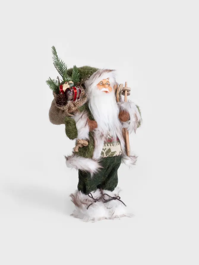 Skrzat CLAUSE Mikołaj zielony z nartami i workiem 30 cm