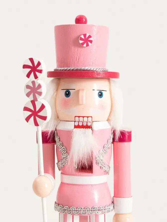 Figurka NUTCRACKER FAIRYTALE dziadek do orzechów różowy z cukierkami 25 cm
