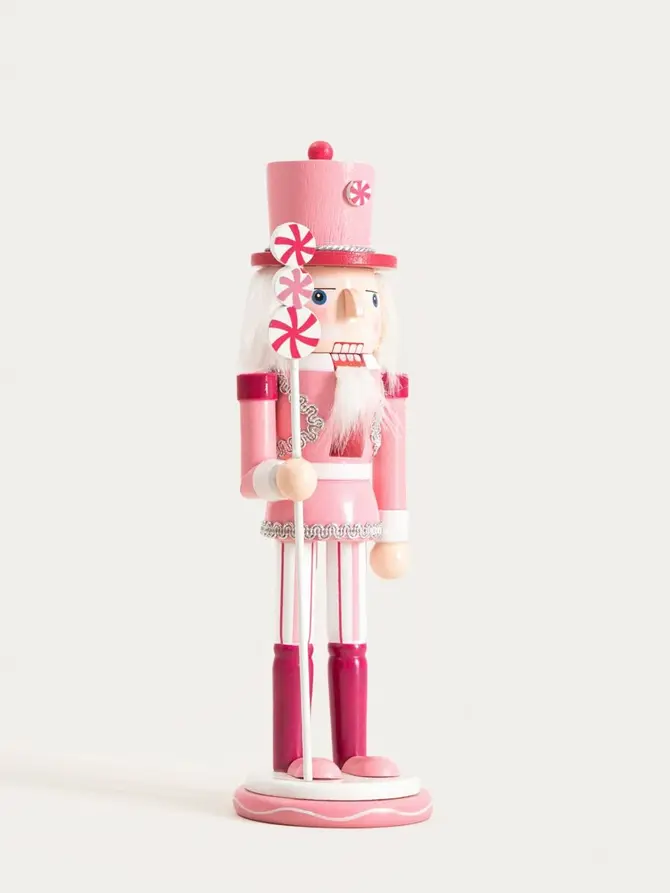 Figurka NUTCRACKER FAIRYTALE dziadek do orzechów różowy z cukierkami 25 cm